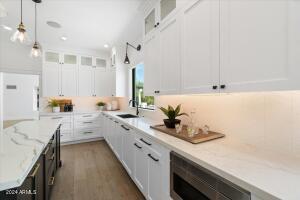 Under Cabinet Lighting Highlights the Chevron Backsplash