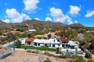 Home has a Large Grass Area, Pool, Sports Court