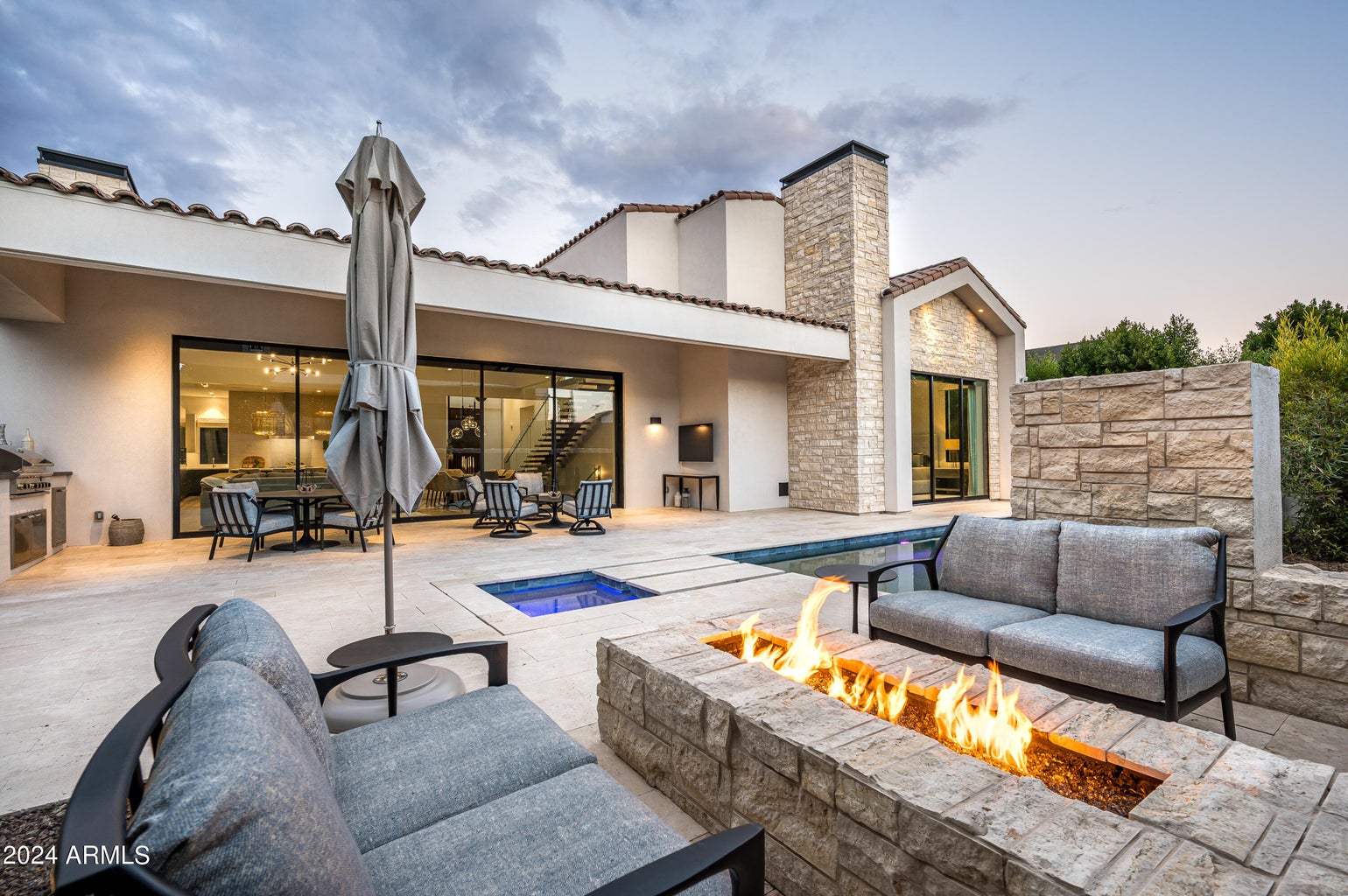 Mesmerizing fire pit perfect for entertaining guests on those cool Arizona evenings.