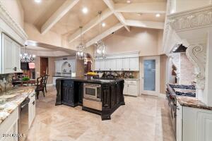 Kitchen island with microwave and warming drawer