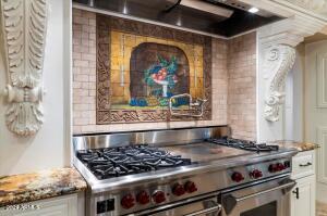 Wolf gas 6 burner stove with two full size ovens & pot filler