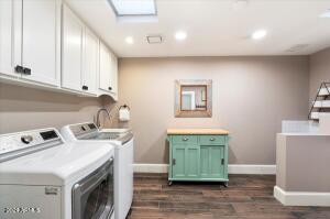 Large laundry room with plenty of storage
