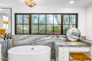 Double Sinks, Soaking Tub, and Vanity